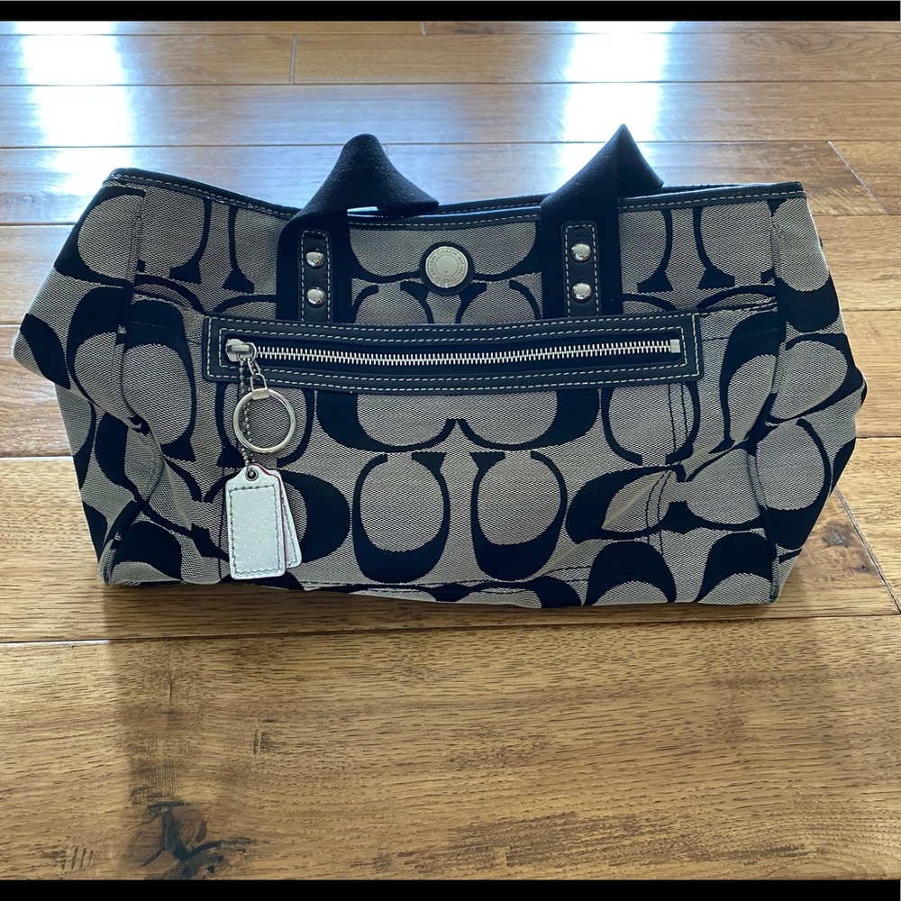Black and pick coach bag